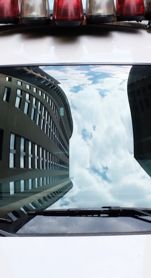 Sky on a squad car